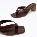 Croc-effect toe mules