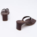 Croc-effect toe mules